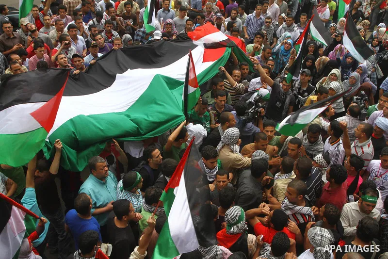Egyptian protesters take part in a protest in front of the Israeli embassy in Cairo on May 15, 2011 in solidarity with Palestinians who mourned the "nakbah" anniversary of Israel's creation in 1948, as a result of which...