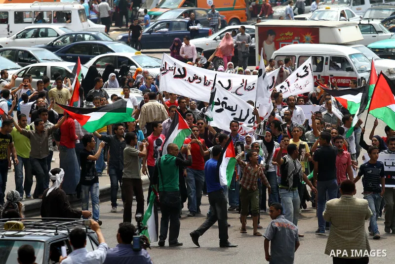 Egyptian protesters take part in a protest in front of the Israeli embassy in Cairo on May 15, 2011 in solidarity with Palestinians who mourned the "nakbah" anniversary of Israel's creation in 1948, as a result of which...