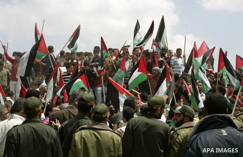 Palestinians rally along the Rafah border terminal between Egypt and the southern Gaza Strip, on May 15, 2011, during a gathering to mark the 63th anniversary of the "Nakba" (catastrophe). Nakba means "catastrophe" in re...
