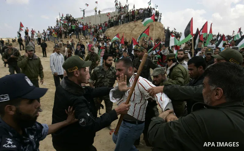 Palestinians rally along the Rafah border terminal between Egypt and the southern Gaza Strip, on May 15, 2011, during a gathering to mark the 63th anniversary of the "Nakba" (catastrophe). Nakba means "catastrophe" in re...