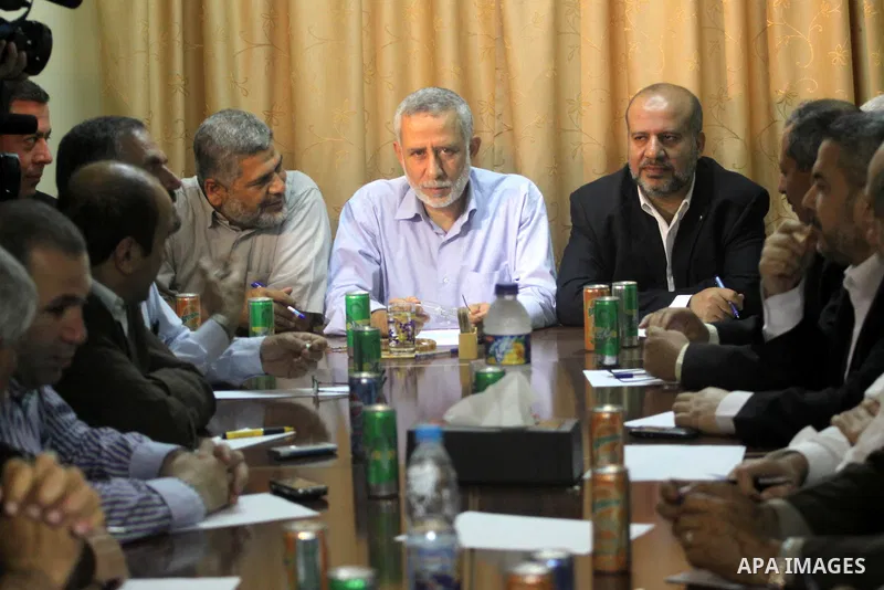 Leaders of Palestinian factions attend a meeting to discuss the latest developments, in Gaza City on May 15,2011. Photo by Mohammed Asad