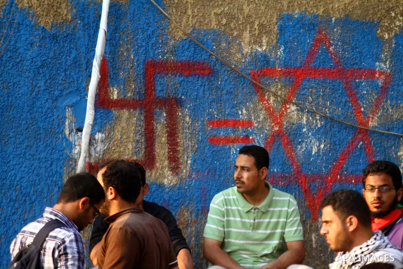 Egyptian protesters take part in a protest in front of the Israeli embassy in Cairo on May 15, 2011 in solidarity with Palestinians who mourned the "nakbah" anniversary of Israel's creation in 1948, as a result of which...