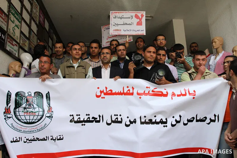 Palestinian journalists protest of the targeting of the freelance journalist Mohammed Othman yesterday from the israeli occupation in gaza city on May 16, 2011. Photo by Mohammed Asad
