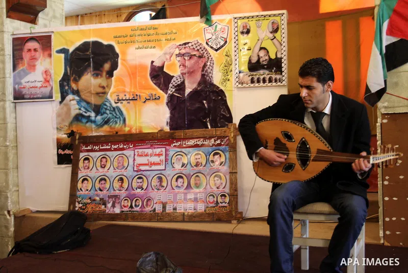 Palestinian artists reside effectiveness to mark the 63th anniversary of "Nakba" (catastrophe), in Gaza City, on May 18, 2011. Hundreds of thousands of Palestinians were uprooted in the 1948 war that led to Israel's crea...