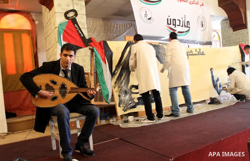Palestinian Artists reside effectiveness and take part in paint a murals to mark the 63th anniversary of "Nakba" (catastrophe), in Gaza City, on May 18, 2011. Hundreds of thousands of Palestinians were uprooted in the 19...
