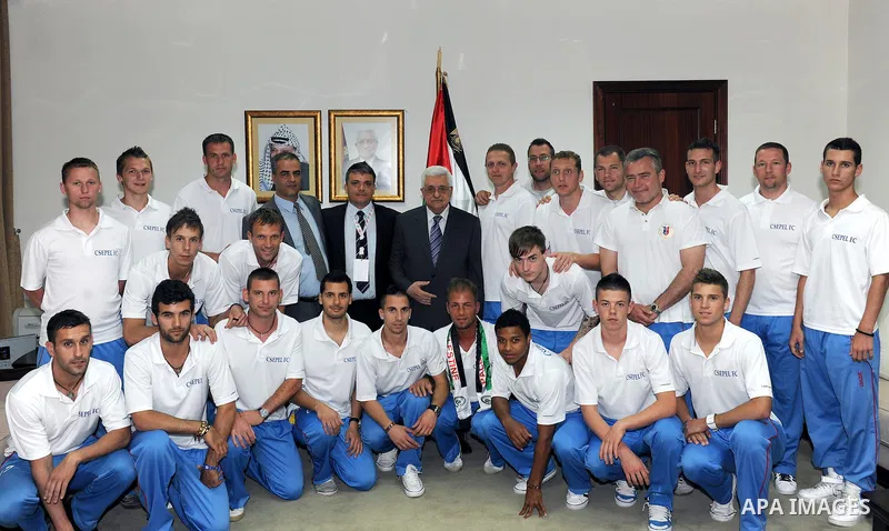 Palestinian President Mahmoud Abbas (Abu Mazen) during a meeting of the Hungary national football team in the West Bank city of Ramallah on May 18, 2011. Photo by Thaer Ganaim