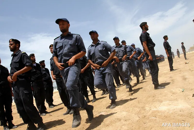 Palestinian Hamas security forces march during a ceremony to honor the Palestinian policemen in Gaza city on May 19, 2011, in the occasion of recognition of the Palestinian Police College. Photo by Mohammed Asad