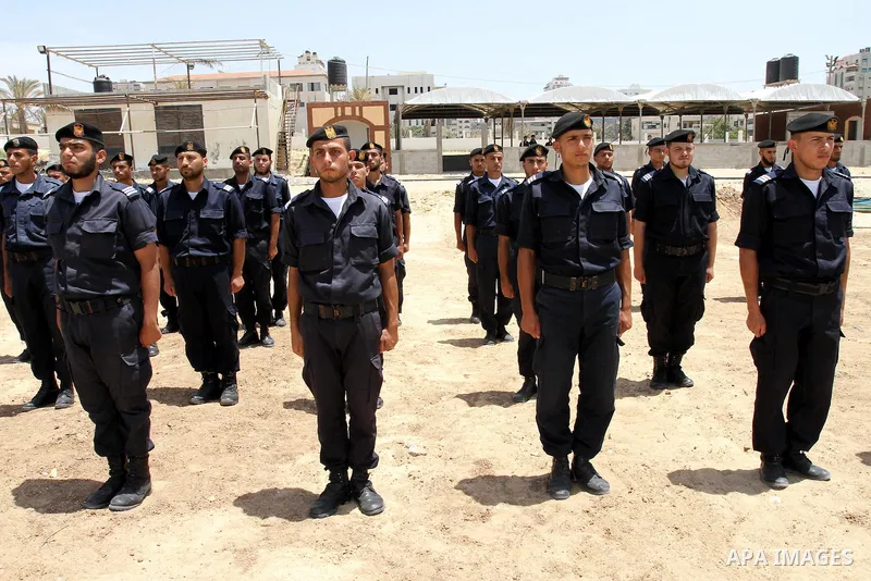 Palestinian Hamas security forces march during a ceremony to honor the Palestinian policemen in Gaza city on May 19, 2011, in the occasion of recognition of the Palestinian Police College. Photo by Mohammed Asad