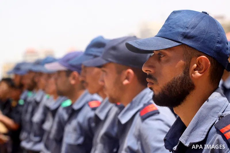 Palestinian Hamas security forces march during a ceremony to honor the Palestinian policemen in Gaza city on May 19, 2011, in the occasion of recognition of the Palestinian Police College. Photo by Mohammed Asad