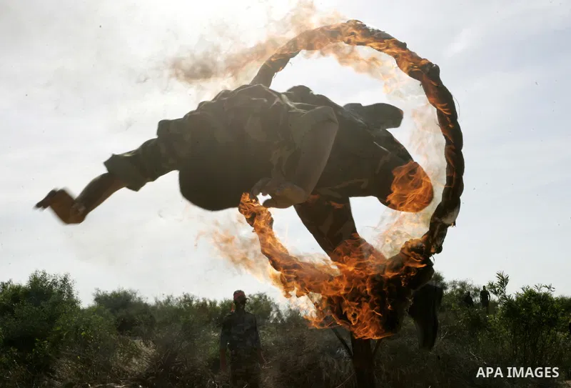 Militants with the Democratic Front for the Liberation of Palestine (DFLP) take part in a military training session in the southern Gaza Strip town of Khan Yunis on May 19, 2011. Photo by Abed Rahim Khatib