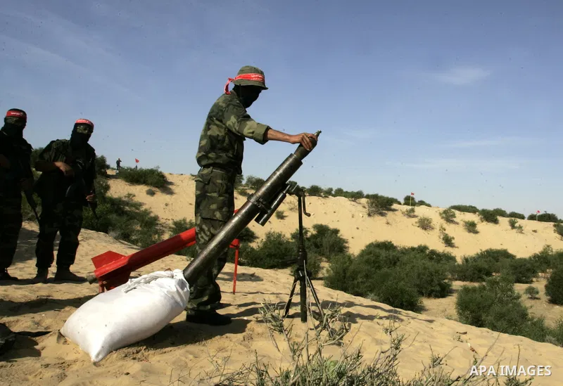 Militants with the Democratic Front for the Liberation of Palestine (DFLP) take part in a military training session in the southern Gaza Strip town of Khan Yunis on May 19, 2011. Photo by Abed Rahim Khatib