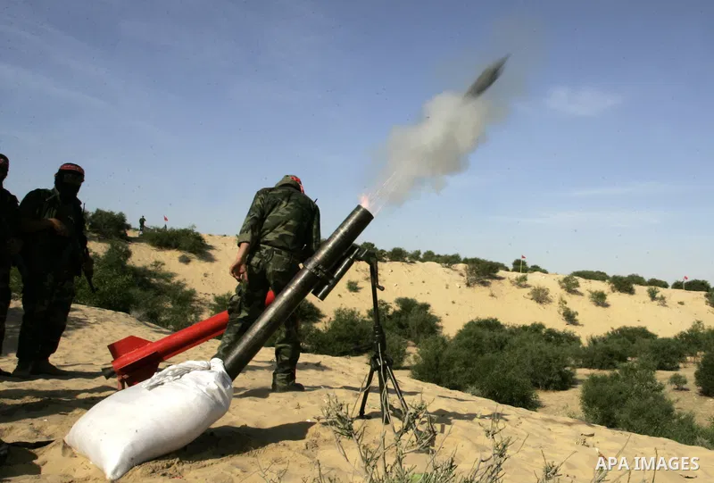 Militants with the Democratic Front for the Liberation of Palestine (DFLP) take part in a military training session in the southern Gaza Strip town of Khan Yunis on May 19, 2011. Photo by Abed Rahim Khatib