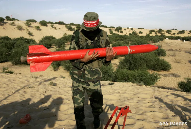 Militants with the Democratic Front for the Liberation of Palestine (DFLP) take part in a military training session in the southern Gaza Strip town of Khan Yunis on May 19, 2011. Photo by Abed Rahim Khatib