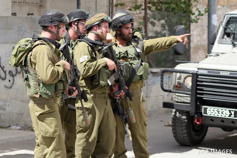 Israeli soldiers stand guard during clashes with Palestinian youths following a demonstration in the West Bank village of Al-khader near Bethlehem, Friday, May 20, 2011. President Barack Obama on Thursday finally uttered...