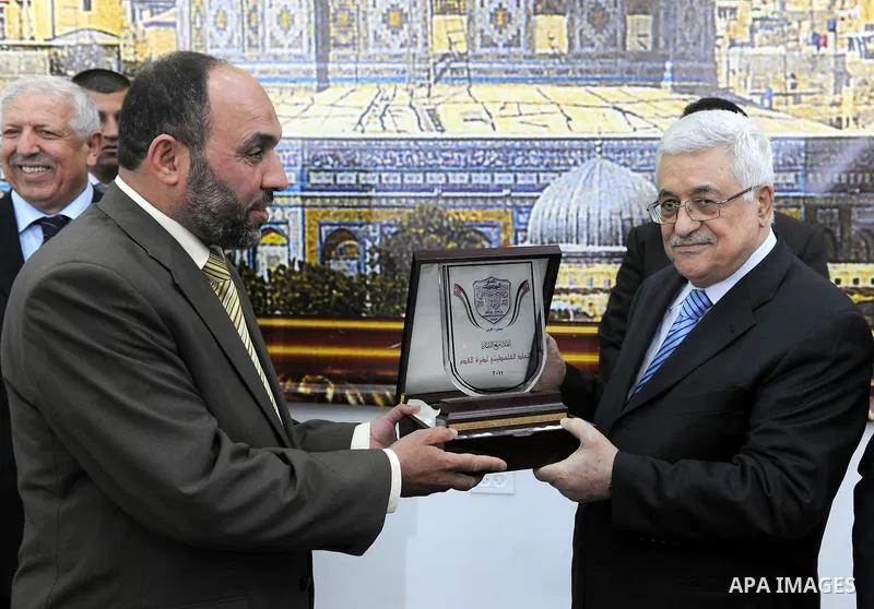 Palestinian President Mahmoud Abbas (Abu Mazen) during a meeting with sports media delegation and Albaqaa football team in the West Bank city of Ramallah on May 20, 2011. Photo by Thaer Ganaim