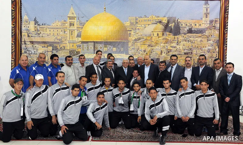 Palestinian President Mahmoud Abbas (Abu Mazen) during a meeting with sports media delegation and Albaqaa football team in the West Bank city of Ramallah on May 20, 2011. Photo by Thaer Ganaim