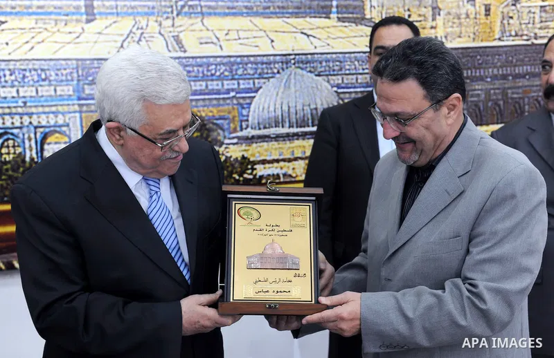 Palestinian President Mahmoud Abbas (Abu Mazen) during a meeting with sports media delegation and Albaqaa football team in the West Bank city of Ramallah on May 20, 2011. Photo by Thaer Ganaim