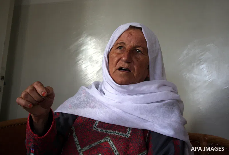 Aisha Aruri, mother of Salah Aruri, a senior member of Hamas exiled in Syria, speaks to the press after she was released from a 24-hours Israeli detention in the West Bank city of Ramallah on May 24, 2011. Salah was arre...
