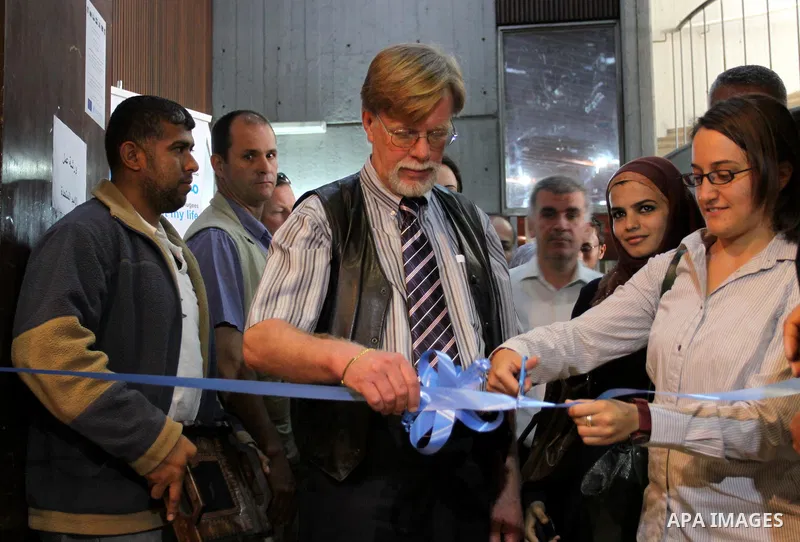 Palestinian winners of photography contest participate in the opening Photo Gallery contest, under the name " What you do not know about my life". which offered pictures of refugees in Gaza city on May 25, 2011. Photo by...