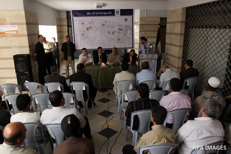 Palestinian members of the Ministry of works and housing attend a press conference to announce the distribution of the governmental lands for citizens in Gaza city on May 25,2011.. Photo by Mohammed Asad