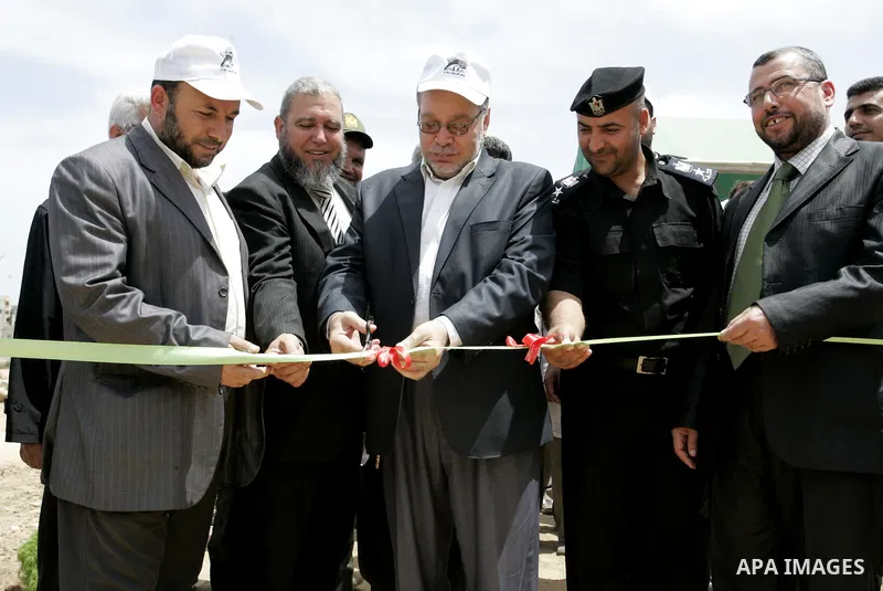 Palestinian tourism and antiquities minister in the Islamist-run government, Mohammed al-Agha attends the openning ceremony of the second stage for searching ancient artifacts recently discovered near the Egyptian border...