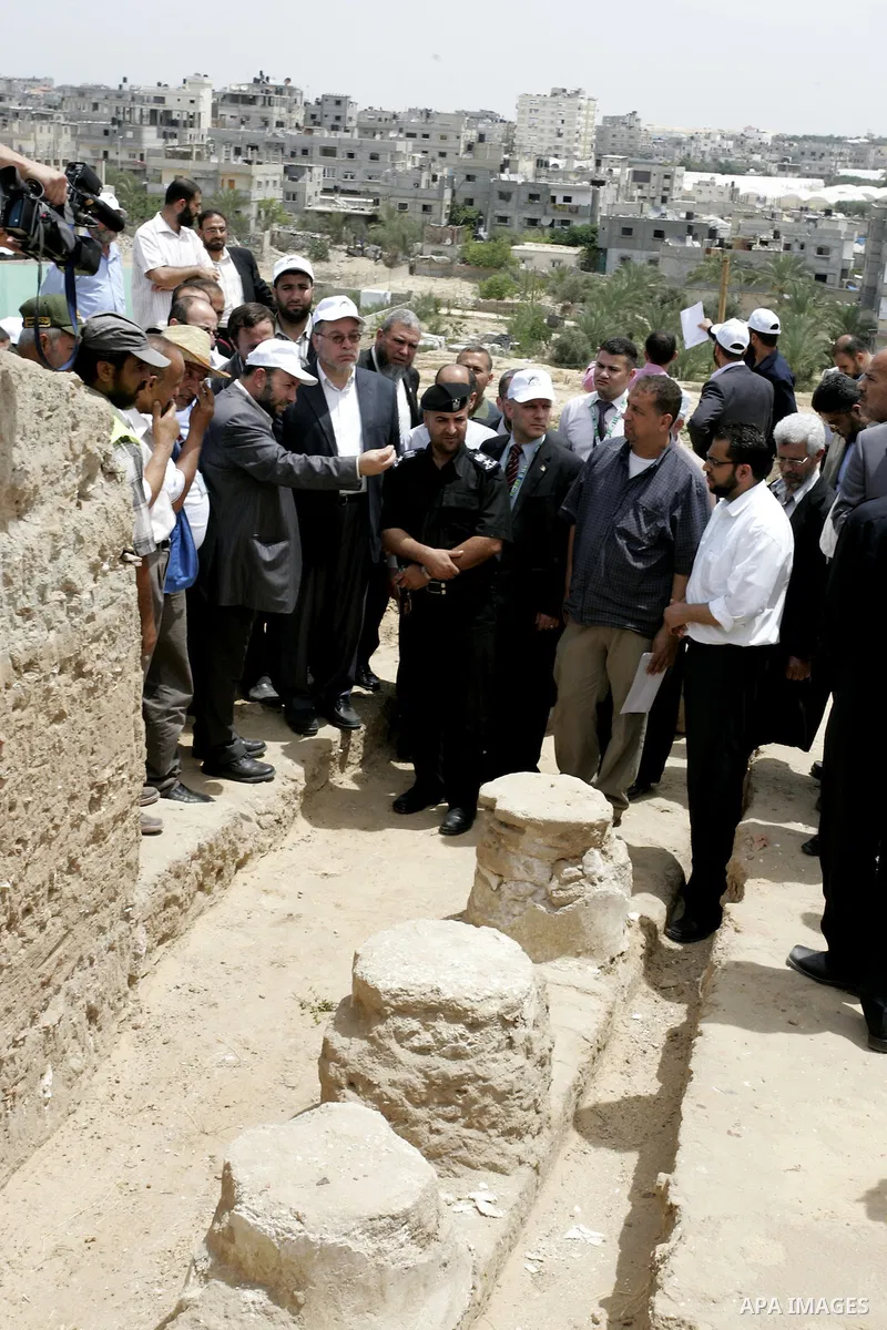 Palestinian tourism and antiquities minister in the Islamist-run government, Mohammed al-Agha attends the openning ceremony of the second stage for searching ancient artifacts recently discovered near the Egyptian border...