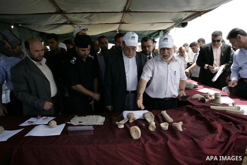 Palestinian tourism and antiquities minister in the Islamist-run government, Mohammed al-Agha attends the openning ceremony of the second stage for searching ancient artifacts recently discovered near the Egyptian border...