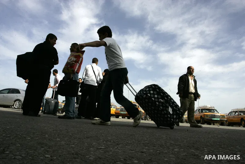 Palestinians wait to cross into Egypt through the Rafah border terminal in the southern Gaza Strip on May 26, 2011, a day after the official MENA news agency reported that Egypt will open the crossing on a daily basis st...