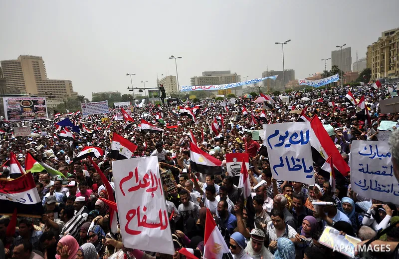 Egyptian protesters take part in a protest at Tahrir Square in Cairo, Egypt Friday, May 27, 2011. Thousands of protesters poured into downtown Cairo's Tahrir Square Friday for what they called a 'second revolution,' stri...