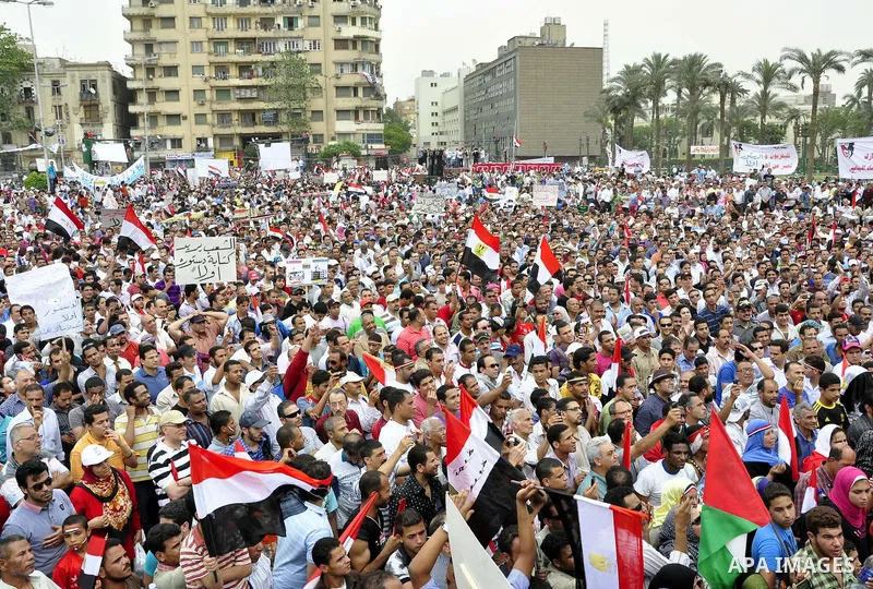 Egyptian protesters take part in a protest at Tahrir Square in Cairo, Egypt Friday, May 27, 2011. Thousands of protesters poured into downtown Cairo's Tahrir Square Friday for what they called a 'second revolution,' stri...