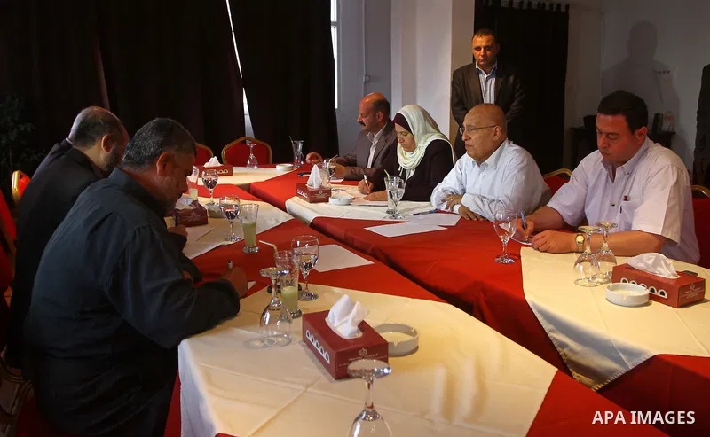 Fatah's commissioner of International relations, meets with Hamas leaders in Gaza City on May 27, 2011 during the former's first visit to the Gaza Strip since the reconciliation agreement between Fatah and Hamas factions...