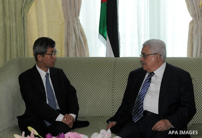 Palestinian President Mahmoud Abbas Abu Mazen) during a meeting with Japan's envoy to the peace process in the Middle East Yutaka Imura in Doha, Qatar on May 28, 2011. Photo by Thaer Ganaim
