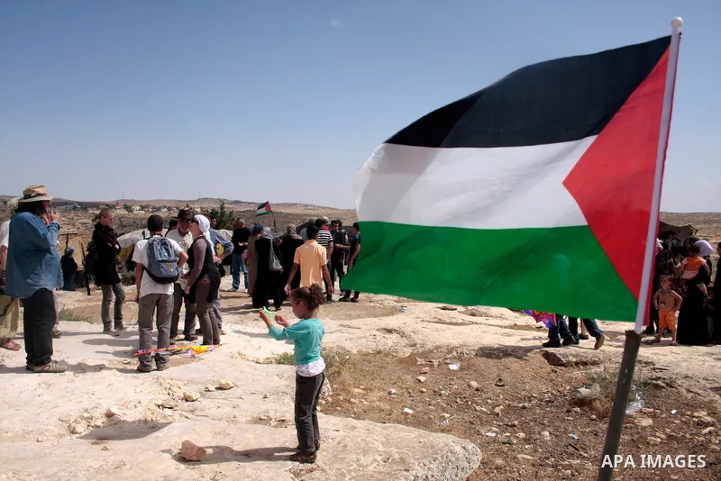 Palestinian, left-wing Israeli and foreign peace activists take part in the opening of the Susiya Creative and Learning Center in the mountains in the area of Yatta village close to the Jewish settlement of Sosia south o...