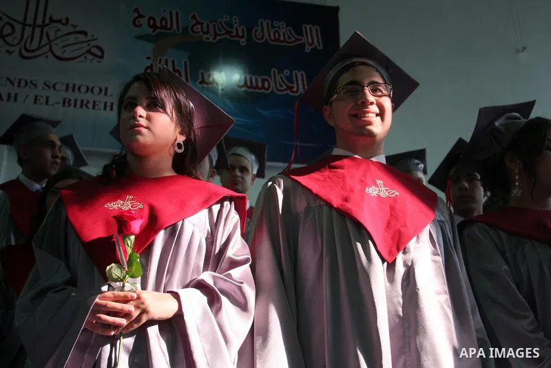 Palestinian students during the graduation ceremony at a "Friends" in the West Bank City of Ramallah, on May 29, 2011. Photo by Issam Rimawi
