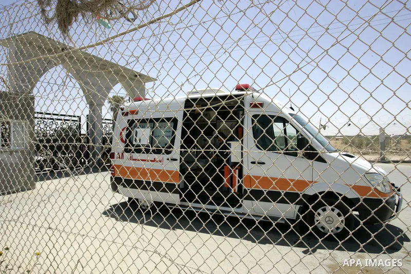Palestinian ambulance in front of the Rafah border crossing in the southern Gaza Strip on May 30, 2011. Egypt eased travel restrictions for residents of Gaza from Saturday, and eroding a blockade that imposed by Israel o...