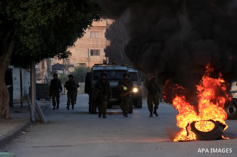 Israeli soldiers take a positions during clashes with Palestinians after Jews pray at the biblical Joseph's Tomb in the West Bank city of Nablus on May 30, 2011. Photo by Wagdi Eshtayah