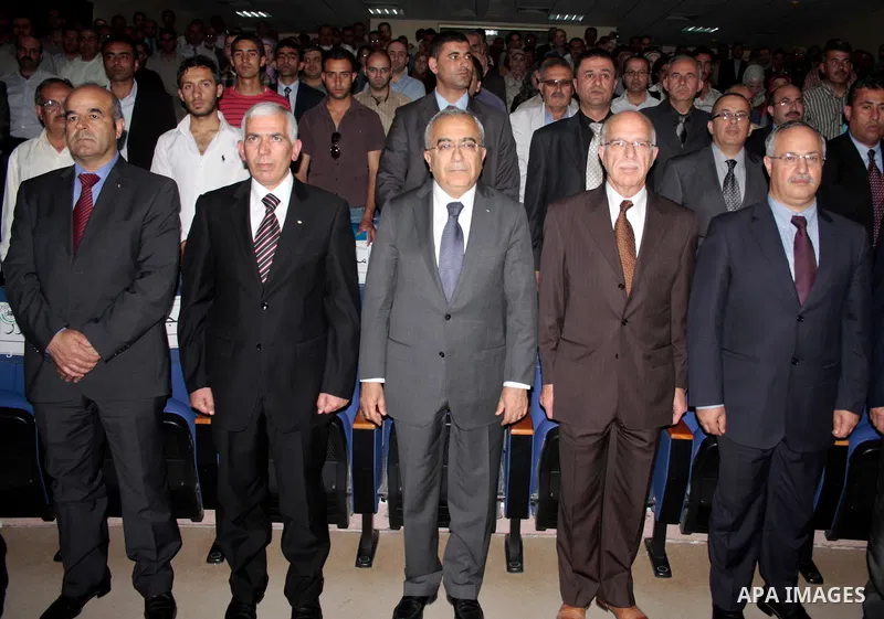 Palestinian prime minister Salam Fayyad attends the opening ceremony during the inauguration of Yasser Arafat Building at Hebron University in the Palestinian city of Hebron in the West Bank on May 30, 2011.Photo by Naje...