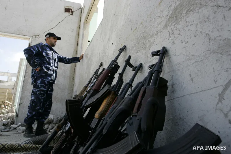 Palestinian member of the Hamas security forces look at the security forces, Hamas during their graduation ceremony in the southern Gaza Strip town of Khan Yunis on 02 June 2011. The release of the captured soldier Versu...