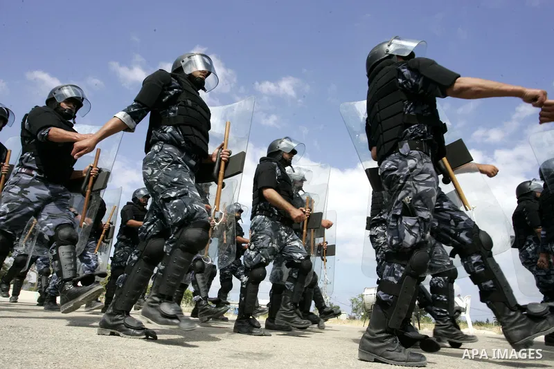 Palestinian Hamas security forces march during a graduation ceremony in the southern Gaza Strip town of Khan Yunis on 02 June 2011. The release of the captured soldier Versus for a thousand Palestinian prisoners . Said n...