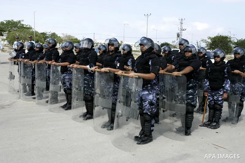 Palestinian Hamas security forces stand at attention during a graduation ceremony in the southern Gaza Strip town of Khan Yunis on 02 June 2011. The release of the captured soldier Versus for a thousand Palestinian priso...