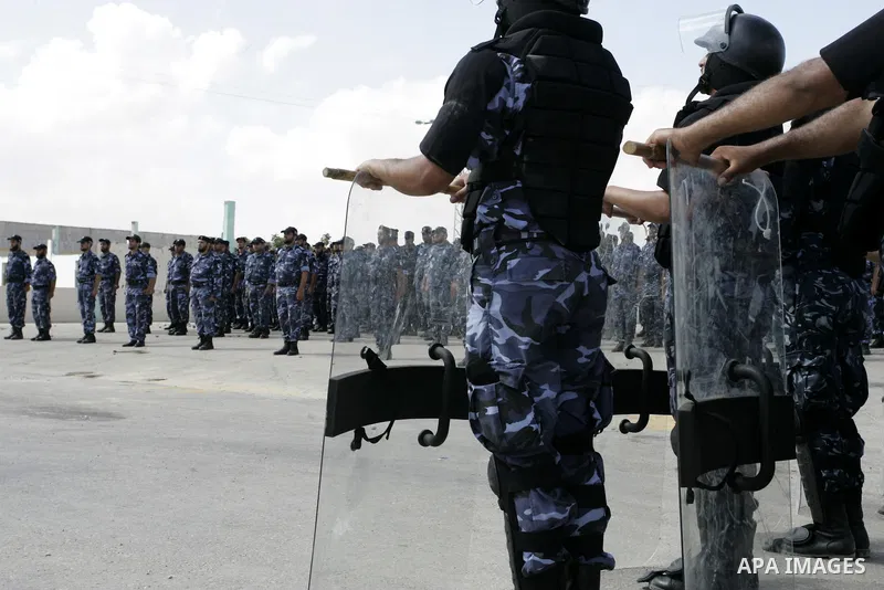 Palestinian Hamas security forces stand at attention during a graduation ceremony in the southern Gaza Strip town of Khan Yunis on 02 June 2011. The release of the captured soldier Versus for a thousand Palestinian priso...