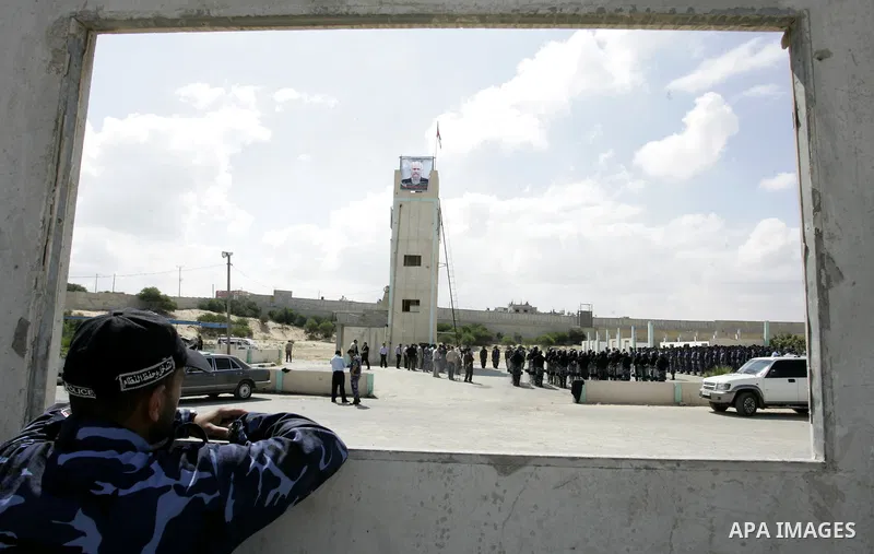 Palestinian member of the Hamas security forces look at the security forces, Hamas during their graduation ceremony in the southern Gaza Strip town of Khan Yunis on 02 June 2011. The release of the captured soldier Versu...