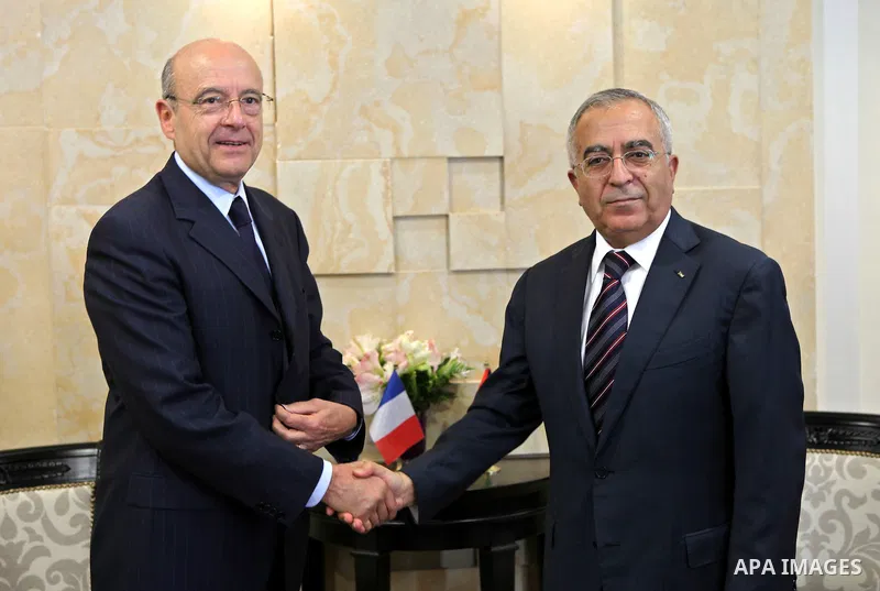 Palestinian Prime Minister Salam Fayyad during a meeting with the French Foreign Minister Alain Juppe in the west bank City of Ramallah on June 2, 2011. Photo by Mustafa Abu Dayeh