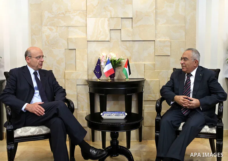 Palestinian Prime Minister Salam Fayyad during a meeting with the French Foreign Minister Alain Juppe in the west bank City of Ramallah on June 2, 2011. Photo by Mustafa Abu Dayeh