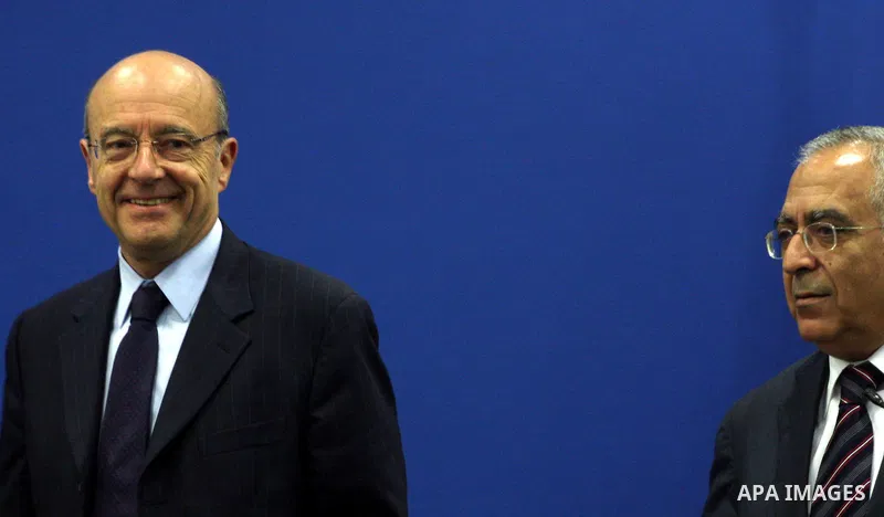 Palestinian Prime Minister, Salam Fayyad and France's Foreign Minister, Alain Juppe during a press conference in the West Bank city of Ramallah on June 2, 2011. as Juppe announced France is ready to host a Middle East pe...