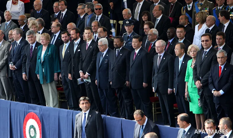 Palestinian president Mahmud Abbas and other heads of states stand in the official tribune during a military parade to mark the anniversary of the founding of the Italian republic in 1946 and the 150th anniversary of Ita...