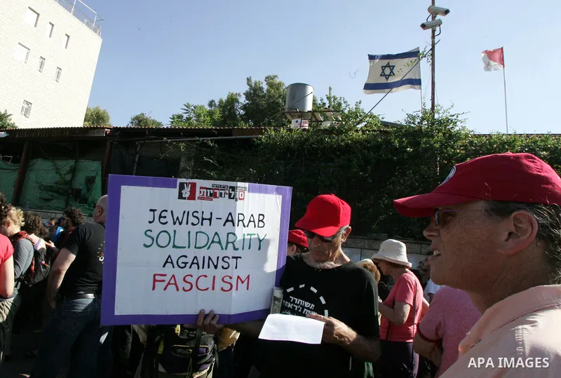 Palestinians, Israelis and foreign activists take part in the weekly demonstration in the neighborhood of Sheikh Jarrah in East Jerusalem on June 3, 2011. Photo by Mahfouz Abu Turk