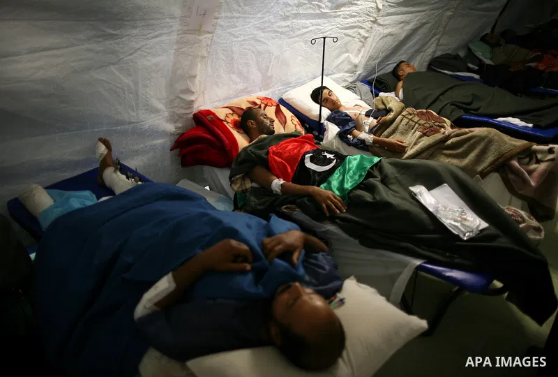 Wounded Libyan rebels were put under medical surveillance at a temporary Intensive Care Unit set up on a ship evacuating injured residents and stranded foreign refugees from the city of Misrata to Benghazi, in the Medite...
