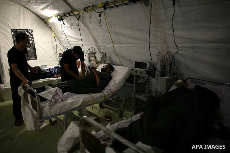 Wounded Libyan rebels were put under medical surveillance at a temporary Intensive Care Unit set up on a ship evacuating injured residents and stranded foreign refugees from the city of Misrata to Benghazi, in the Medite...