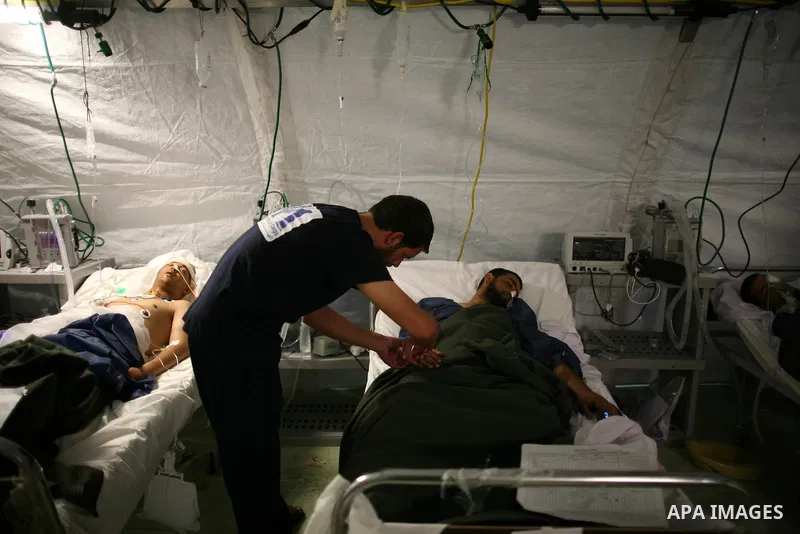 Wounded Libyan rebels were put under medical surveillance at a temporary Intensive Care Unit set up on a ship evacuating injured residents and stranded foreign refugees from the city of Misrata to Benghazi, in the Medite...